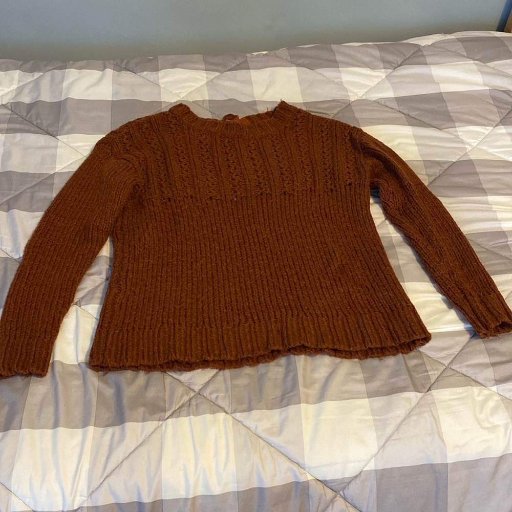 Burnt Orange knit Sweater with a cute cut out and bow in the back